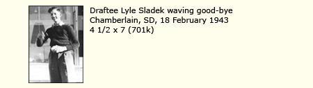 DRAFTEE LYLE SLADEK, CHAMBERLIAN, SOUTH DAKOTA, 18 FEBRUARY 1943; EATING A GRAPEFRUIT WHILE WAVING GOOD-BYE